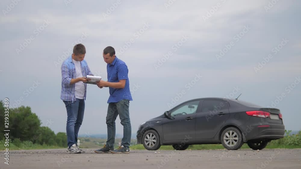 On the road car accident insurance agent examining carcrash owner and insurance staff lifestyle make paper form. two men make a deal. man seller driver makes car the auto insurance slow motion video On the road car accident insurance agent examining carcrash owner and insurance staff lifestyle make paper form. two men make a deal. man seller driver makes car the auto insurance slow motion video