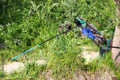 Fishing with a fishing rod on the river bank