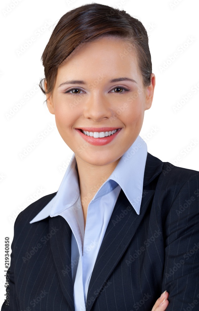 Smiling Young Businesswoman with Crossed Arms - Isolated Smiling Young Businesswoman with Crossed Arms - Isolated