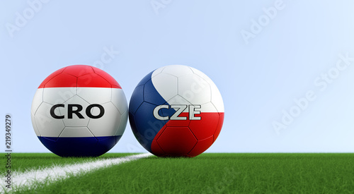 Czech Republic vs. Croatia Soccer Match - Soccer balls in Czech Republic and Croatia national colors on a soccer field. Copy space on the right side - 3D Rendering 