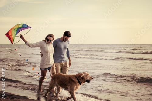 happy couple enjoying time together at beach