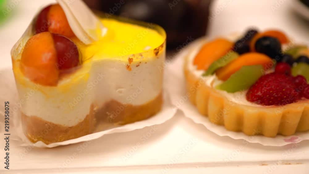 Assorted gourmet fresh cakes and fruit pastries Assorted gourmet fresh cakes and fruit pastries