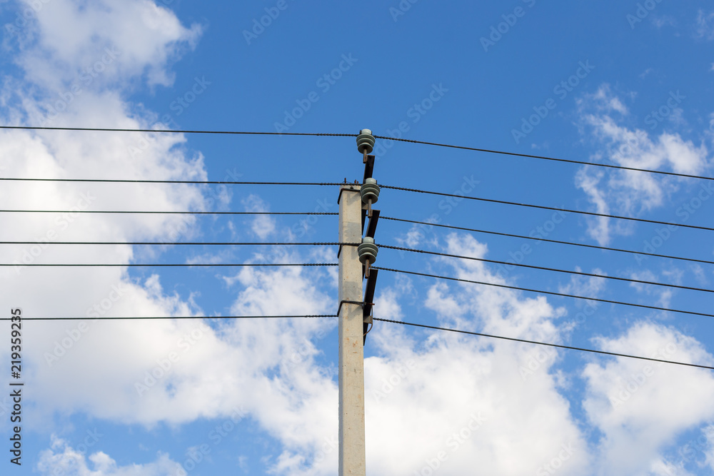 Electrical pole and wires against the sky Electrical pole and wires against the sky
