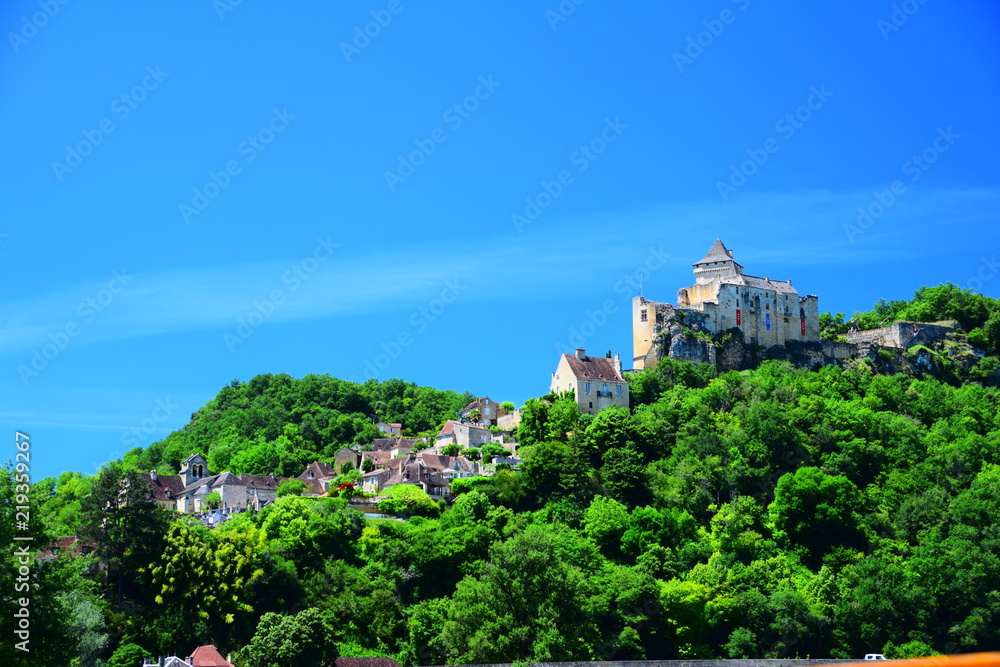The fortress of Castelnaud-La-Chappelle, as seen from the Dordogne River in the Perigord region of France