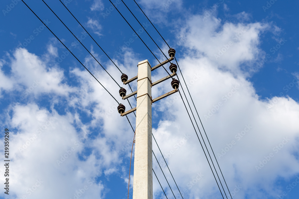 Electrical pole and wires against the sky Electrical pole and wires against the sky