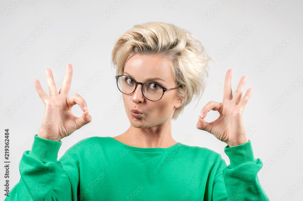 Beautiful woman is showing ok sign. Positive human emotions Beautiful woman is showing ok sign. Positive human emotions