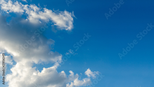 Blue sky background with clouds