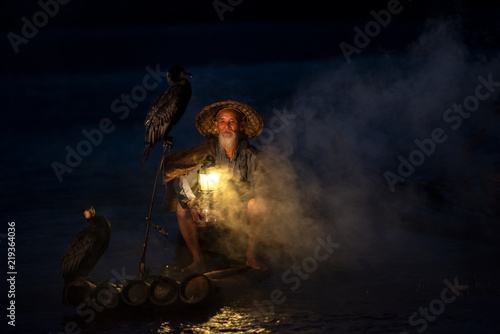 Fisherman of Guilin, Li River and Karst mountains during the blue hour of dawn,Guangxi China