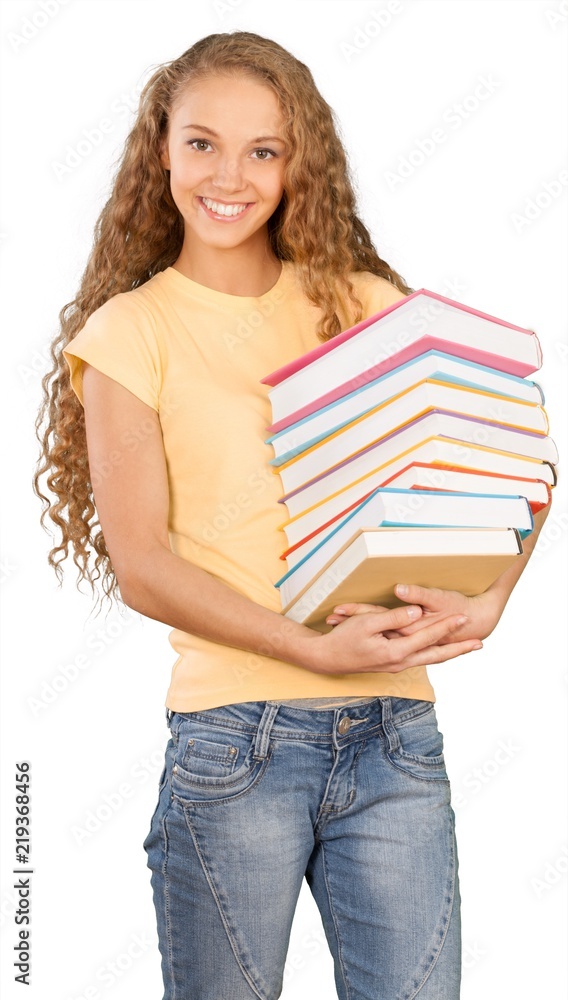 Pretty young woman with heap of books isolated on white Pretty young woman with heap of books isolated on white