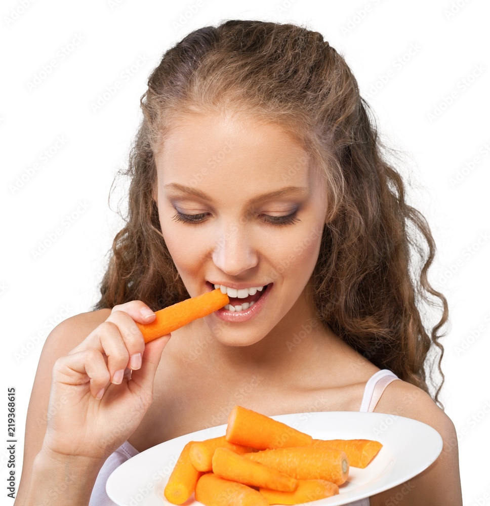 Portrait of a Young Woman Eating Carrots Portrait of a Young Woman Eating Carrots