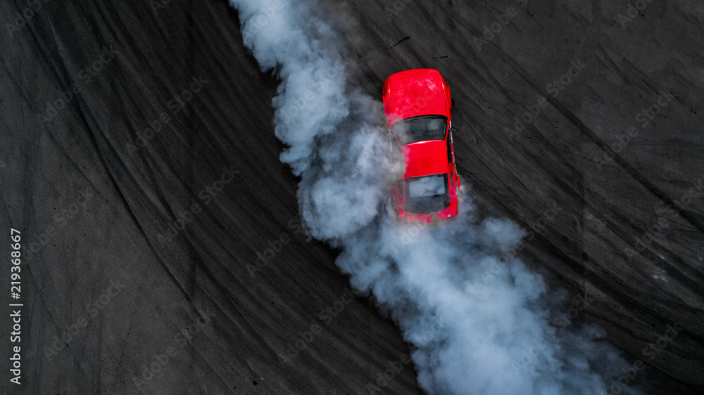 Aerial top view professional driver drift car on asphalt track with smoke, View from above car drift.