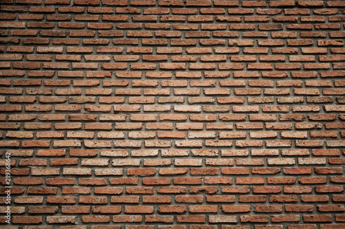 Red brick wall background or texture, vignette on corner