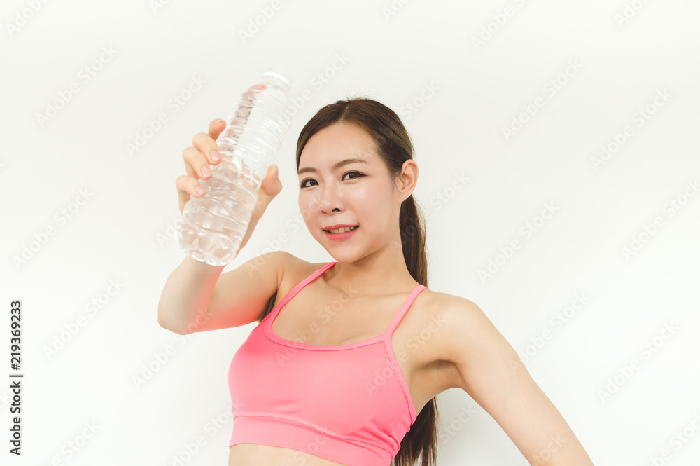 Exercise concept. Athletes are tired of exercising. Beautiful girl drinking water after exercise. Exercise concept. Athletes are tired of exercising. Beautiful girl drinking water after exercise.