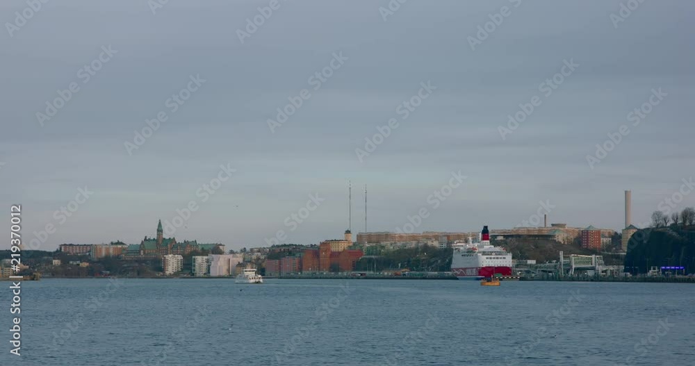 Small ferry crosses the harbour in Stockholm Small ferry crosses the harbour in Stockholm