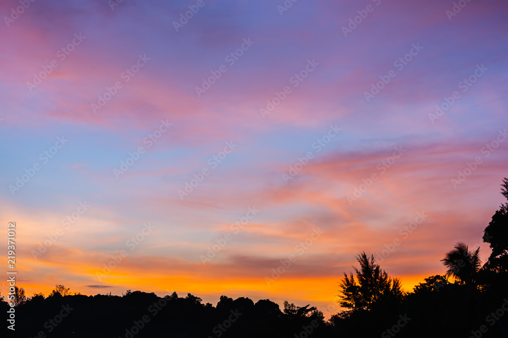 Colorful twilight sky after sunset with dramatic cloud.
