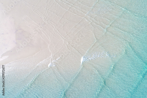 Fototapeta Naklejka Na Ścianę i Meble -  White sand beach nature background turquoise sea wave water aerial view