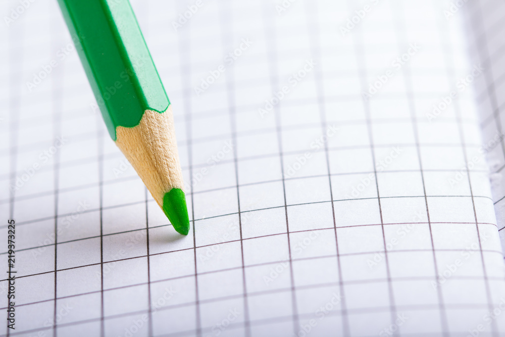 green pencil notebook close-up
green pencil notebook close-up