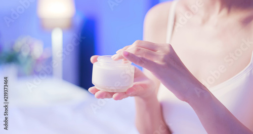 woman take lotion