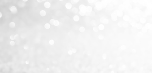 silver and white bokeh lights defocused. abstract background