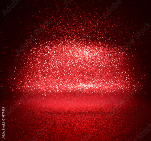glitter vintage lights texture. red christmas abstract background. defocused
