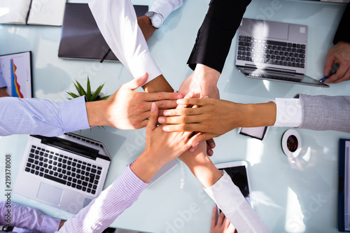 Group Of Businesspeople Stacking Hands