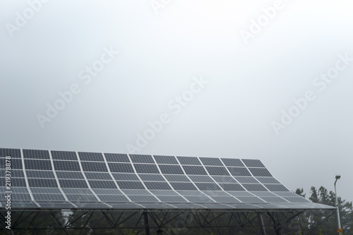Solar panels on rainy and cloudy day
