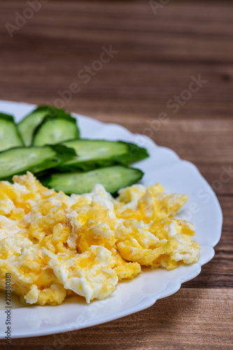 Healthy breakfast - fresh eggs with cucumbers