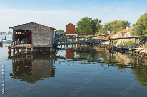 Mussel cultivation, shacks at Scardovari lagoon, Po' river delta, Adriatic sea, Italy, UNESCO World Heritage Site.