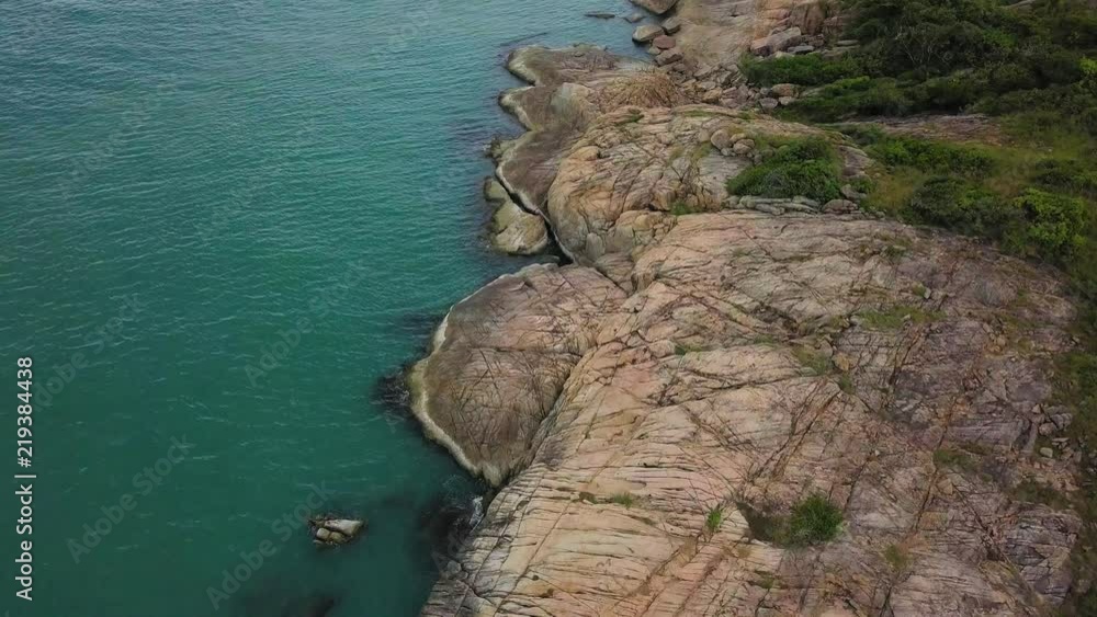 Aerial View of Rocky Sea Shore with Turquoise Water Aerial View of Rocky Sea Shore with Turquoise Water