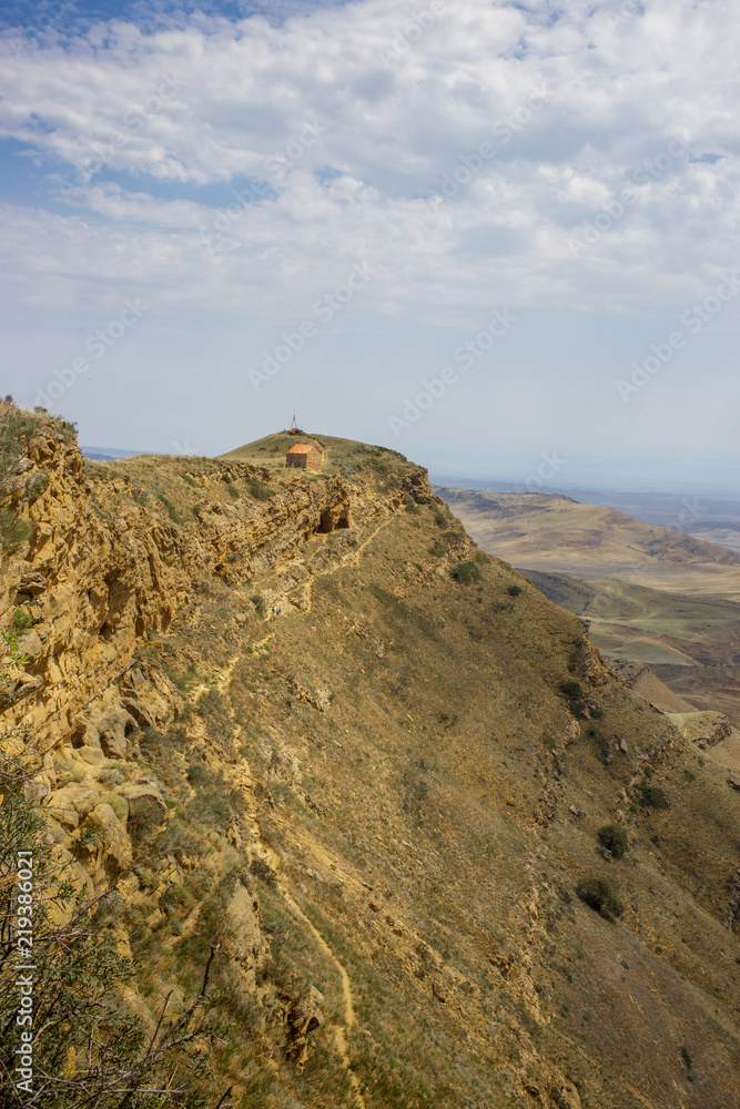 Fototapeta premium day scene, mount slope, valley. Steppe landscape, top view Georgia the Caucasus