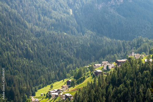 Impression of a rural Village in the rugged Alpine Mountains in the Italian Dolomites on a beatiful Summer's Afternoon.