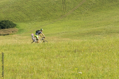 Cyclist on a meadow. Slovakia