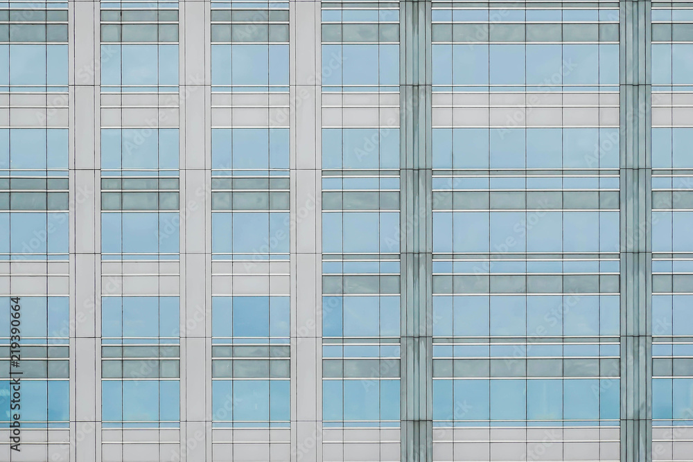 Facade of a modern glss fronted building in Bangkok, Thailand. Facade of a modern glss fronted building in Bangkok, Thailand.