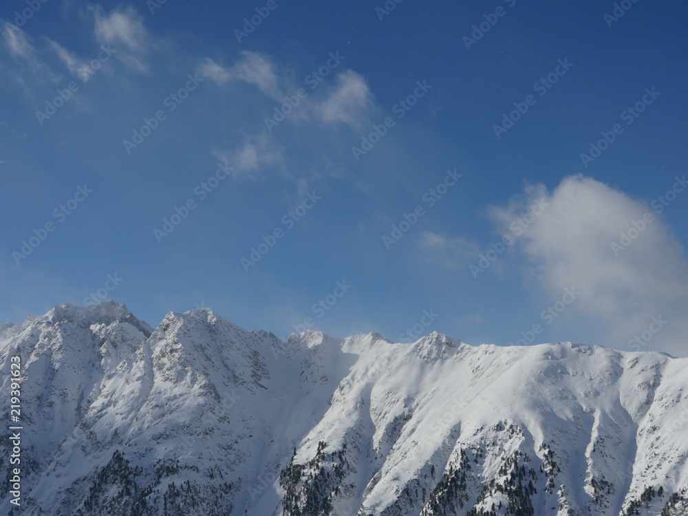 Winter snow covered mountain peaks in Europe. Great place for sports Winter snow covered mountain peaks in Europe. Great place for sports