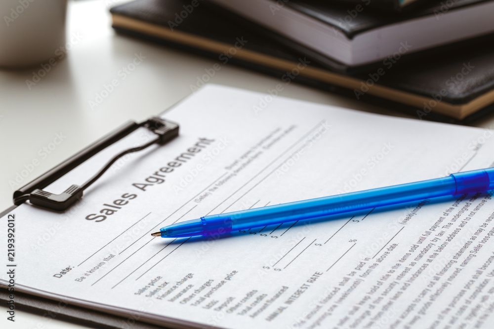 contract form, selling and buying home or condo concept contract form, selling and buying home or condo concept