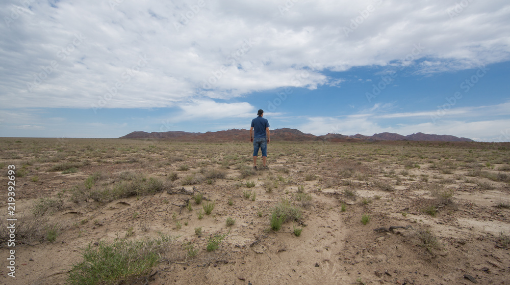 male tourist in the steppe