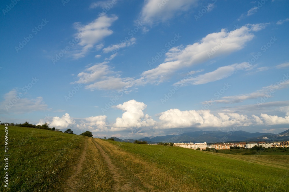 Fototapeta premium Sunrise and sunset over the hills and town. Slovakia