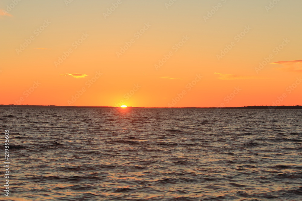 sun rise on the water at Gippsland Lakes