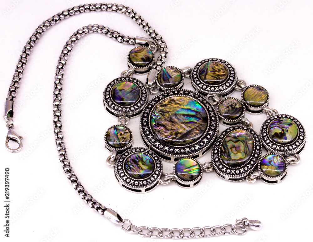 Obraz premium Mother of pearl beads with a silver cut