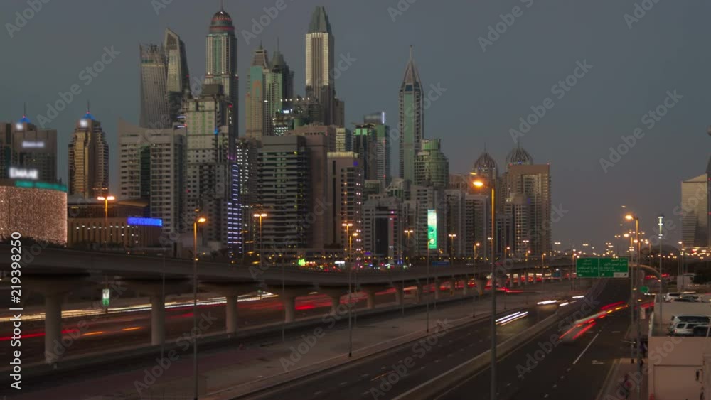 Dubai city traffic sunset time lapse. pan up Dubai city traffic sunset time lapse. pan up