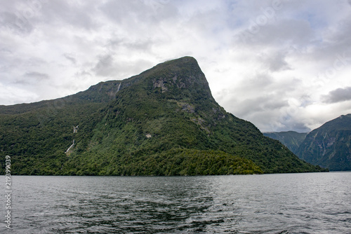 Waterfalls cascade the peaks of Doubtful Sound © BCT
