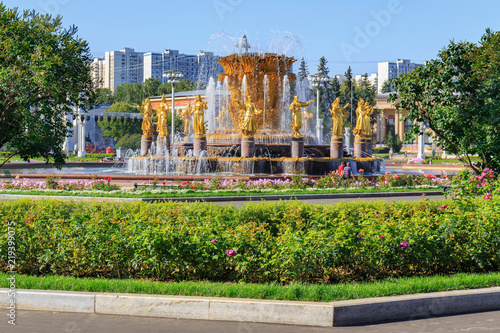 Fountain Friendship of peoples on Exhibition of Achievements of National Economy (VDNH) in Moscow on a blue sky background in sunny summer morning photo