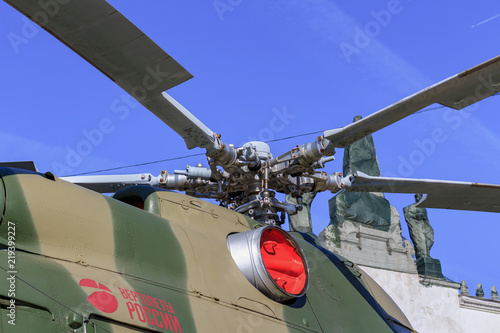 Engines and blades of helicopter MI-8T closeup against blue sky on Exhibition of Achievements of National Economy (VDNH) in Moscow