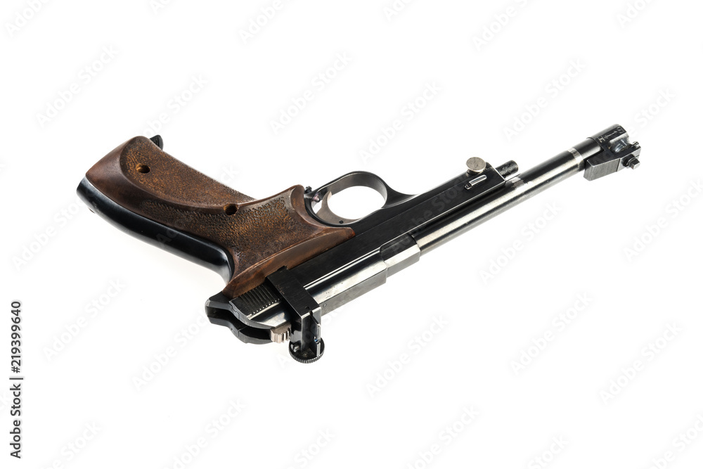 isolated used old sports pistol on a white background isolated used old sports pistol on a white background