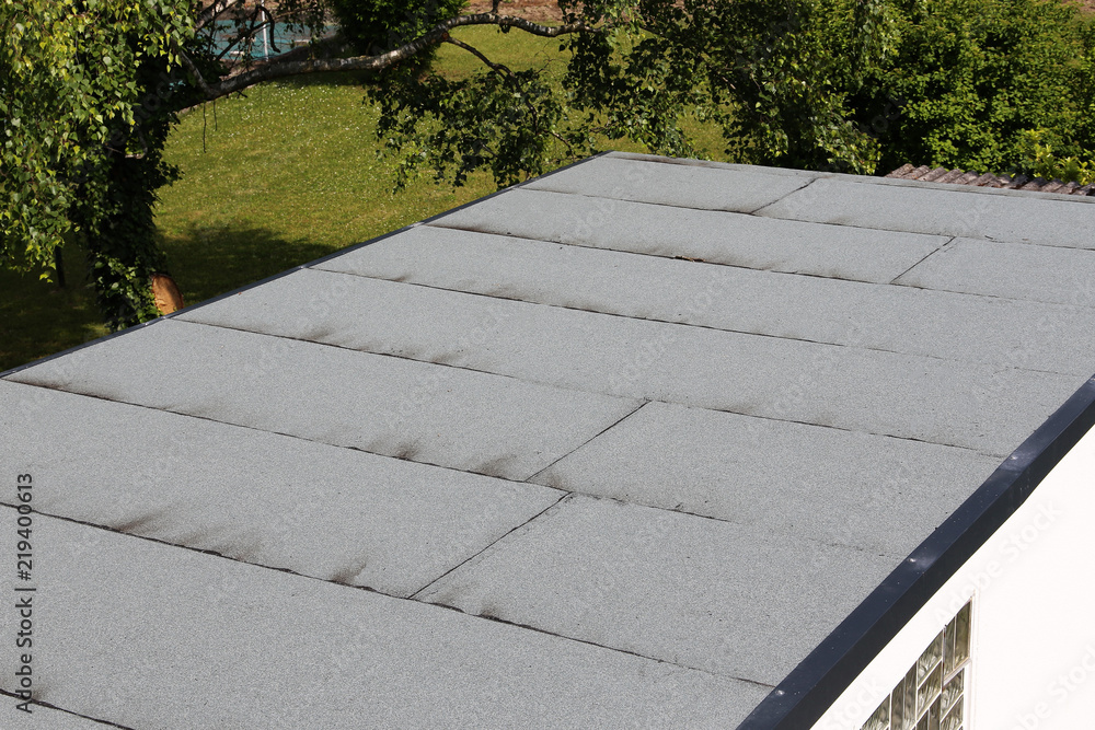 Waterproofing flat roof with bitumen sealing membranes - obrazy, fototapety, plakaty 