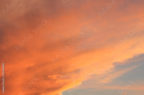 Beautiful orange sunset sky. Natural background © olyasolodenko