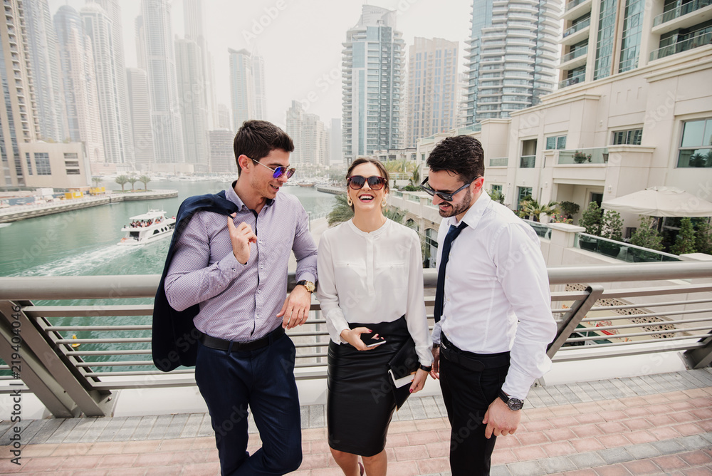 Photography Three business people i suit taking a break from hard work