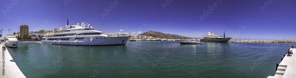 Panorama of a huge yatch in Puerto Banus, a luxury harbour and marina in Marbella popular for the jetset