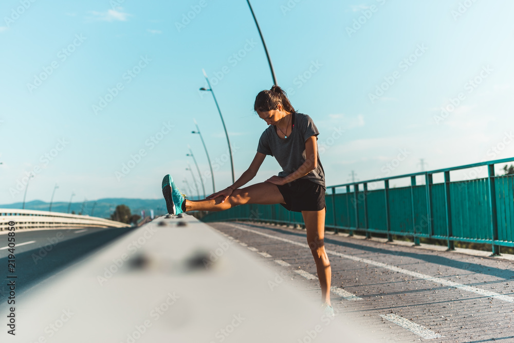 Naklejka premium Stretching exercises before running