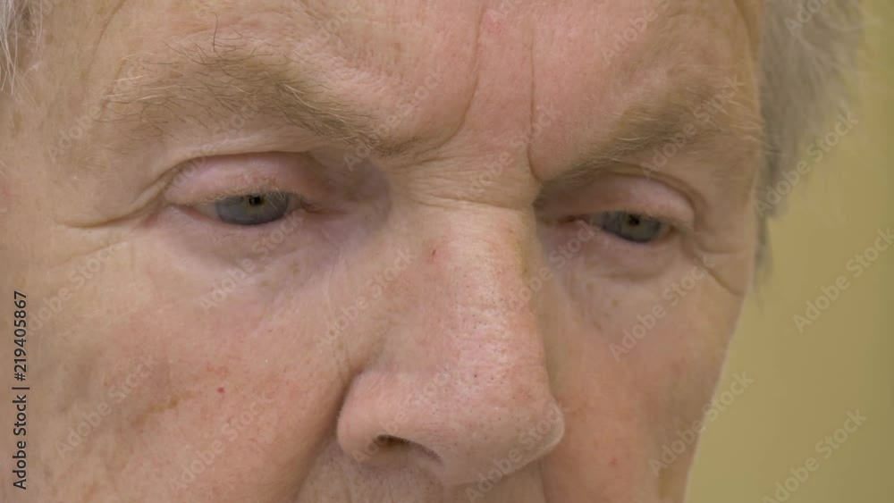 Big Closeup of older woman's eyes looking down Big Closeup of older woman's eyes looking down